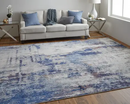 8' X 10' Ivory and Blue Abstract Power Loom Distressed Non Skid Area Rug