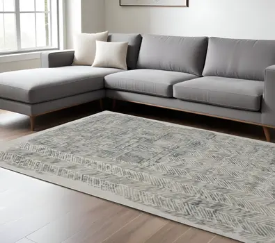 12' X 15' Green Blue And Ivory Abstract Hand Woven Distressed Area Rug