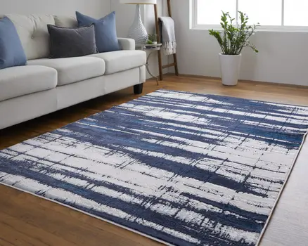 5' X 8' Ivory and Blue Abstract Power Loom Distressed Non Skid Area Rug