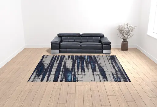 10' X 13' Ivory Blue And Gray Abstract Power Loom Distressed Area Rug