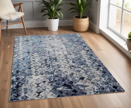 4' X 6' Blue and Ivory Geometric Power Loom Distressed Non Skid Area Rug
