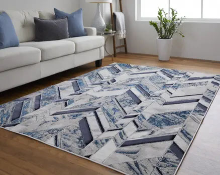 9' X 12' Ivory Blue And Gray Chevron Power Loom Distressed Area Rug