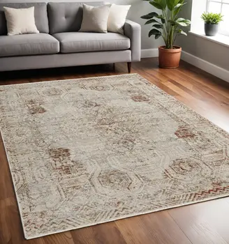 5' X 8' Gray Ivory And Burnt Orange Oriental Distressed Area Rug With Fringe