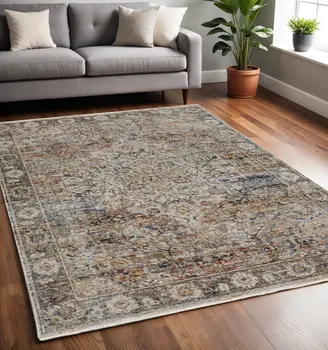5' X 8' Tan and Blue Floral Power Loom Distressed Non Skid Area Rug With Fringe