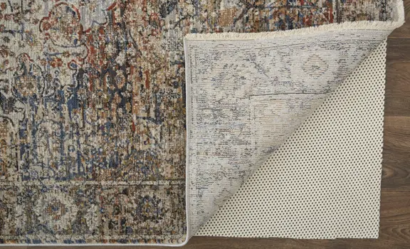 5' X 8' Tan and Blue Floral Power Loom Distressed Non Skid Area Rug With Fringe