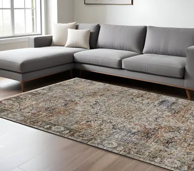 8' X 10' Tan and Blue Floral Power Loom Distressed Non Skid Area Rug With Fringe