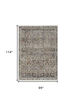 8' X 10' Tan and Blue Floral Power Loom Distressed Non Skid Area Rug With Fringe