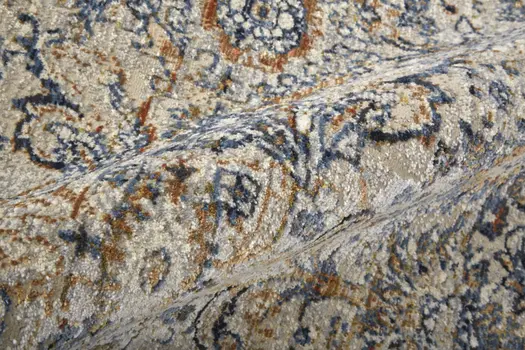 8' X 10' Tan and Blue Floral Power Loom Distressed Non Skid Area Rug With Fringe