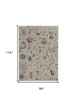 8' X 10' Ivory and Blue Floral Power Loom Distressed Non Skid Area Rug With Fringe
