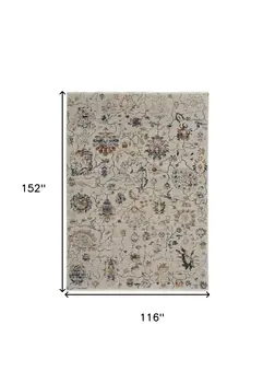 10' X 13' Ivory Orange And Blue Floral Power Loom Distressed Area Rug With Fringe