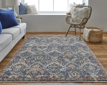 8' X 10' Blue Orange And Ivory Floral Power Loom Area Rug With Fringe