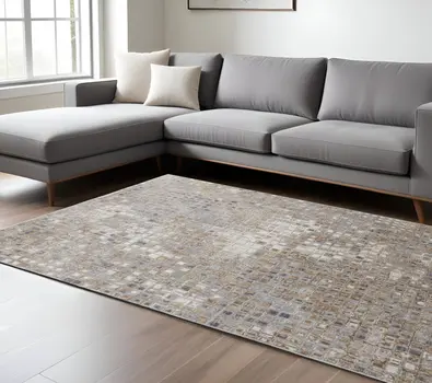 8' X 10' Tan Ivory And Blue Geometric Power Loom Distressed Area Rug
