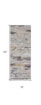 10' Tan and Ivory Abstract Power Loom Distressed Non Skid Runner Rug