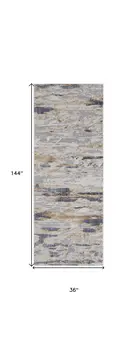 12' Tan Orange And Ivory Abstract Power Loom Distressed Runner Rug