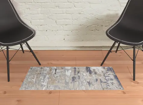 2' X 3' Tan Orange And Ivory Abstract Power Loom Distressed Area Rug