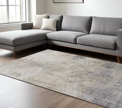 8' X 10' Tan and Ivory Abstract Power Loom Distressed Non Skid Area Rug