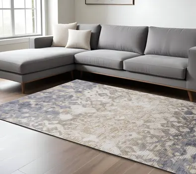 8' X 10' Tan and Ivory Abstract Power Loom Distressed Non Skid Area Rug