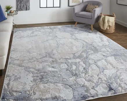 5' X 8' Ivory And Blue Abstract Power Loom Distressed Area Rug