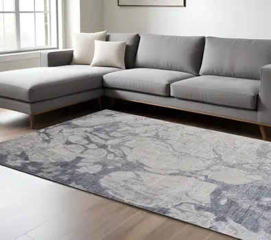8' X 10' Ivory and Blue Abstract Power Loom Distressed Non Skid Area Rug