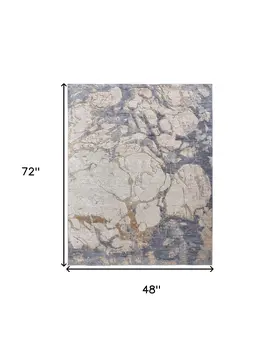 4' X 6' Tan And Blue Abstract Power Loom Distressed Area Rug