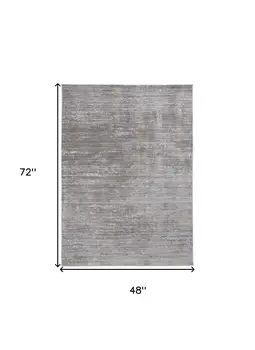 4' X 6' Taupe Silver And Tan Abstract Power Loom Area Rug