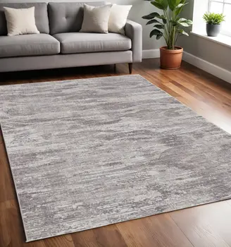 5' X 8' Tan and Gray Abstract Power Loom Distressed Area Rug