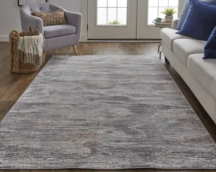 8' X 10' Taupe Tan and Orange Abstract Power Loom Distressed Area Rug
