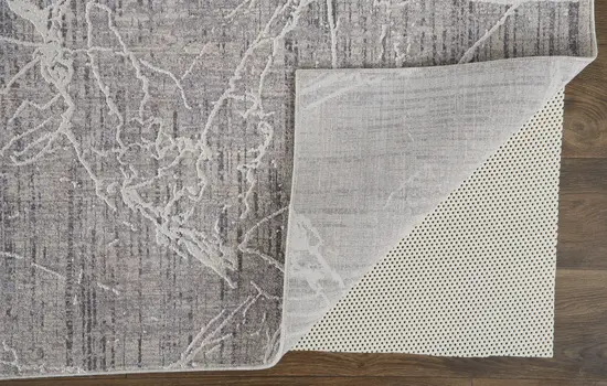 2' X 3' Taupe And Gray Abstract Power Loom Distressed Stain Resistant Area Rug