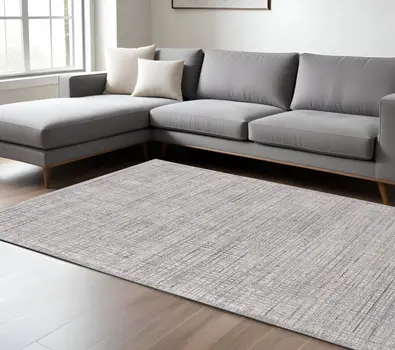 8' X 10' Taupe and Ivory Plaid Power Loom Distressed Area Rug