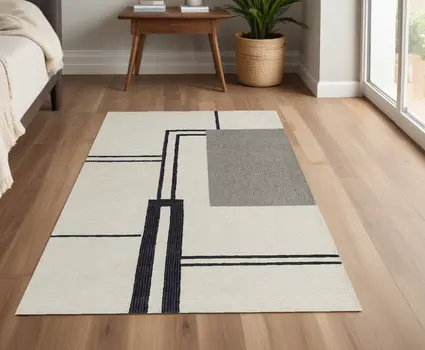 4' X 6' Gray and Ivory Wool Abstract Geometric Hand Tufted Area Rug