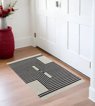 2' X 3' Black and Ivory Abstract Geometric Hand Tufted Area Rug