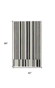 4' X 6' Ivory and Black Wool Abstract Hand Tufted Area Rug