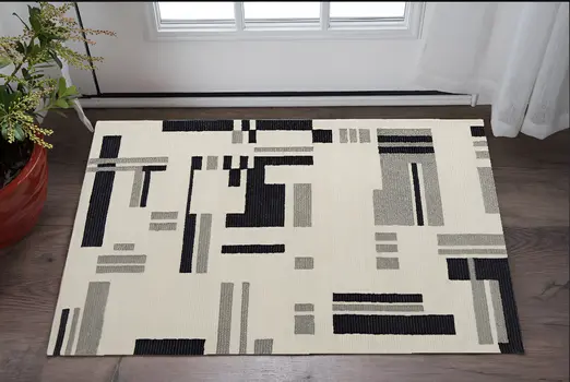 2' X 3' Ivory Wool Abstract Hand Tufted Area Rug