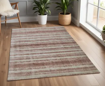 4' X 6' Tan and Ivory Abstract Hand Woven Area Rug