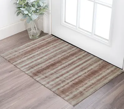 2' X 3' Tan and Ivory Abstract Hand Woven Area Rug