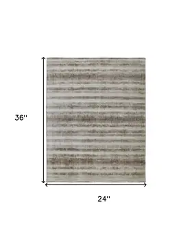 2' X 3' Tan Ivory And Brown Abstract Hand Woven Area Rug