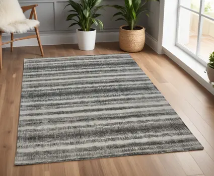4' X 6' Gray and Black Abstract Hand Woven Area Rug