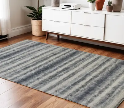 4' X 6' Ivory And Blue Abstract Hand Woven Area Rug