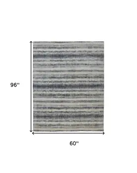 5' X 8' Ivory And Blue Abstract Hand Woven Area Rug