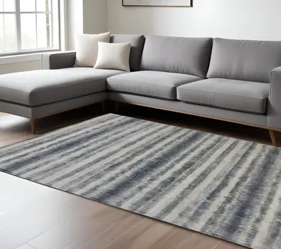 10' X 14' Ivory And Blue Abstract Hand Woven Area Rug