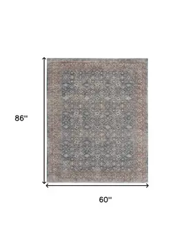5' X 7' Blue and Beige Floral Power Loom Area Rug