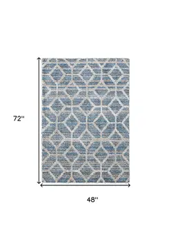 4' X 6' Blue And Ivory Geometric Power Loom Stain Resistant Area Rug