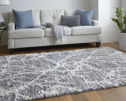 5' X 8' Gray And Ivory Abstract Power Loom Stain Resistant Area Rug