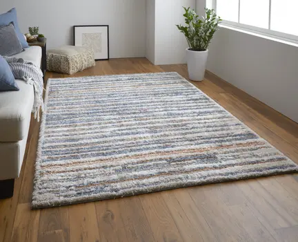 5' X 8' Ivory Blue And Orange Striped Power Loom Stain Resistant Area Rug