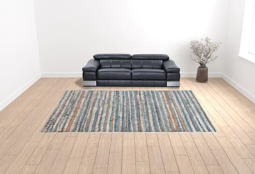 10' X 14' Ivory Blue And Orange Striped Power Loom Stain Resistant Area Rug