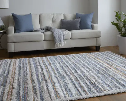 10' X 14' Ivory Blue And Orange Striped Power Loom Stain Resistant Area Rug