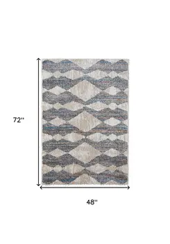 4' X 6' Tan Ivory And Blue Chevron Power Loom Stain Resistant Area Rug