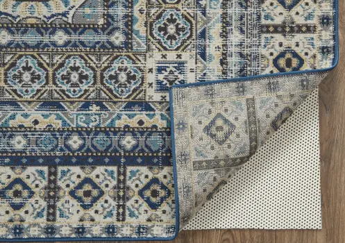 7' X 10' Ivory Tan And Blue Abstract Power Loom Distressed Stain Resistant Area Rug