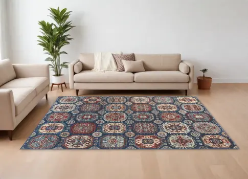 10' X 13' Blue Red And Tan Abstract Power Loom Distressed Stain Resistant Area Rug