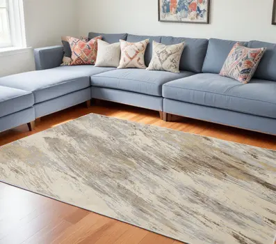 8' X 10' Ivory Tan And Brown Abstract Area Rug